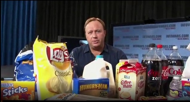 image commentator alex jones at table with food items